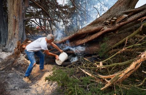 Man putting out fire